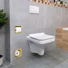 A modern bathroom with a wall-mounted toilet and built-in toilet paper holders. Voir les images du produit