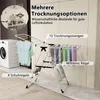 A laundry drying rack with clothes and shoes on it, next to a washing machine. Podgląd zdjęcia produktu