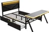 A black metal bed frame with an integrated desk and LED lighting. Voir les images du produit