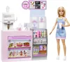 A Barbie doll stands next to a toy cafe playset. Produktbild-Vorschau