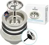 A disassembled sink strainer assembly and its packaging. Produktbild-Vorschau