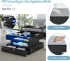 A modern black coffee table with LED lighting and storage, shown in a living room setting. Inset images highlight features like protective film and ease of cleaning. Produktbild-Vorschau