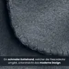 A close-up view of a dark gray fleece blanket, showing its texture and stitched edge. Produktbild-Vorschau