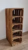 A tall wooden shelf unit made from crates against a white wall and on a wooden floor. Produktbild-Vorschau
