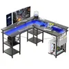 An L-shaped gaming desk with LED lighting, monitors, a laptop, and a computer tower. Produktbild-Vorschau