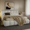 A bedroom scene with a bed as the focal point. Náhľad obrázku produktu