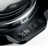 A close-up view of a kitchen scale with a digital display showing a weight measurement. Voir les images du produit
