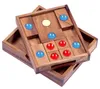 A wooden puzzle game with blue and red marbles. Produktbild-Vorschau
