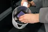 A person is cleaning the inside of a kettle with a sponge. Produktbild-Vorschau