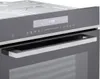 A close-up view of the control panel and handle of a built-in oven. Produktbild-Vorschau