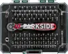 A top-down view of a bit set in a clear plastic case, with a ratchet handle in the center. Produktbild-Vorschau
