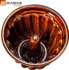 A close-up, top-down view of a brown ceramic gugelhupf baking mold. Voir les images du produit