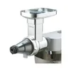 A close-up view of a kitchen appliance attachment, likely a juicer or grinder, mounted on a larger kitchen machine. Anteprima dell’immagine prodotto