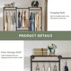 Product details of a clothing rack with hanging clothes and shelves. Produktbild-Vorschau
