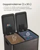 A close-up view of the top of a dual-compartment trash can with both lids open, showing the interior bins and their contents. Produktbild-Vorschau