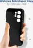 A hand holding a black phone case with a microfiber inlay. Produktbild-Vorschau