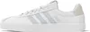 A white Adidas shoe with light gray stripes and beige accents on a white background. Produktbild-Vorschau