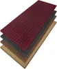 A stack of four rectangular rugs in different colors, layered diagonally on a white background. Produktbild-Vorschau