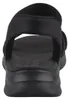 Das Bild zeigt eine schwarze Sandale die ein modernes Design hat. Die Ansicht ist von der Seite und hebt die klaren Linien und die stilvollen Riemen hervor. Produktbild-Vorschau