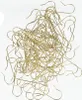 A pile of gold-colored ornament hooks against a white background. Produktbild-Vorschau