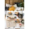 Quatre bols en porcelaine sur un plateau en bambou pour Voir les images du produit 13