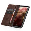 A brown leather flip case for a smartphone, open to reveal the phone screen and card slots. Produktbild-Vorschau
