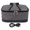 A gray insulated bag with a black trim and two zippers on top, with a black USB cable coiled below it. Náhľad obrázku produktu