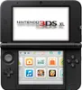 A black Nintendo 3DS XL handheld game console is shown from the front, displaying its home screen. Produktbild-Vorschau