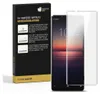 A product box for screen protectors next to a smartphone. Produktbild-Vorschau