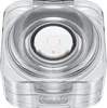 A top-down view of a clear, square-shaped charging case for a smart ring. Anteprima dell’immagine prodotto