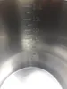 A close-up view of the interior of a stainless steel bucket with volume markings. Produktbild-Vorschau