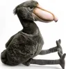 A plush toy shoebill bird sitting on a white background. Náhled obrázku produktu