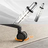 Close-up of office chair components, showing gas lift cylinders and a caster wheel on a carpeted floor. Anteprima dell’immagine prodotto