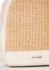 Close-up of a woven straw panel and cream-colored faux leather trim on a bag, with a brand logo. Produktbild-Vorschau