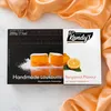 Kandylas Loukoumi Bergamotte 200 g auf orangefarbenem Stoff Produktbild-Vorschau