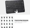 A black Bluetooth keyboard with a touchpad is shown from a top-down perspective, with a diagram of hand gestures for the touchpad below. Náhled obrázku produktu