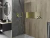 A modern bathroom with a shower and vanity area. Voir les images du produit