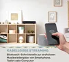 A living room setting with a shelf unit, electronic device, and a smartphone. Produktbild-Vorschau