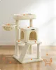 A beige cat tree with multiple levels and features, set against a light background with dotted lines and orange circles indicating features.