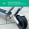 Close-up of an electric scooter's rear wheel and deck, with a green banner at the top containing text and an eye icon. Produktbild-Vorschau