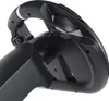 A close-up, angled view of a black gaming steering wheel accessory against a white background. Podgląd zdjęcia produktu