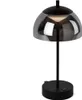 A black table lamp with a smoked glass shade is shown against a white background. Produktbild-Vorschau