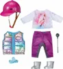 A flat lay of a doll's equestrian outfit and accessories. Produktbild-Vorschau