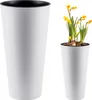 Two white planters are shown against a white background. The planter on the left is empty, while the planter on the right contains yellow daffodils. Náhled obrázku produktu