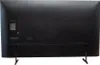 The back of a black Samsung LED TV with its stand attached. Produktbild-Vorschau