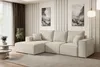 A modern living room with a beige sectional sofa, abstract art on the wall, and marble-effect side tables. Produktbild-Vorschau