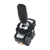 A close-up studio shot of a black and silver toggle switch. Produktbild-Vorschau