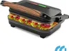 A sandwich maker with sandwiches inside, shown from a slightly elevated front-left angle. Produktbild-Vorschau