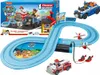 A Paw Patrol Carrera First slot car race track set with two cars and accessories, displayed on a white background. Voir les images du produit