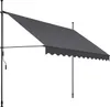 A gray awning with a scalloped edge is extended from a black pole structure against a white background. Náhled obrázku produktu